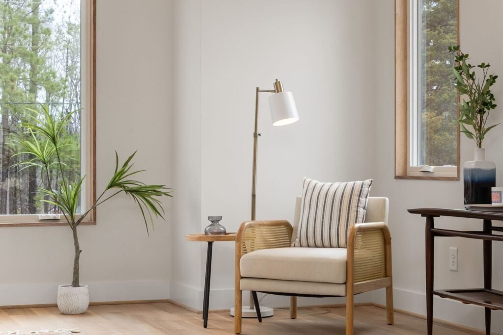 Serene minimalist living room with natural lighting and stylish decor.